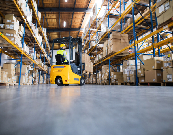 Warehouse man worker with forklift