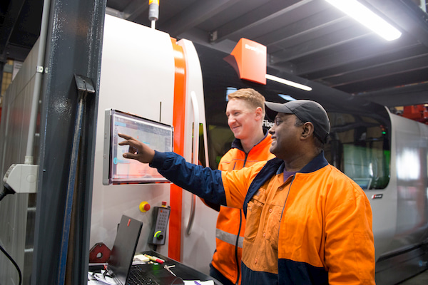 Two happy men while working