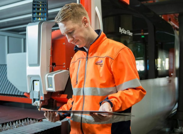 Man using machinery to drill