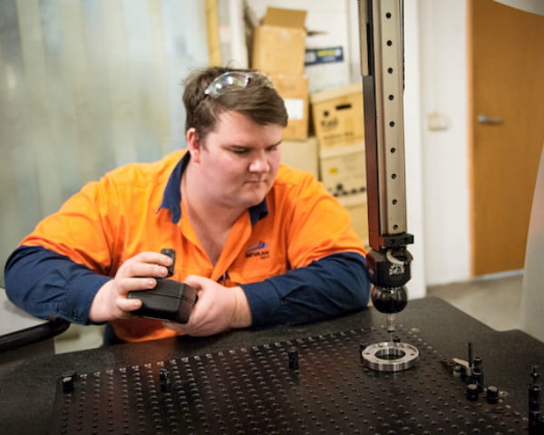 Man working at the machinery