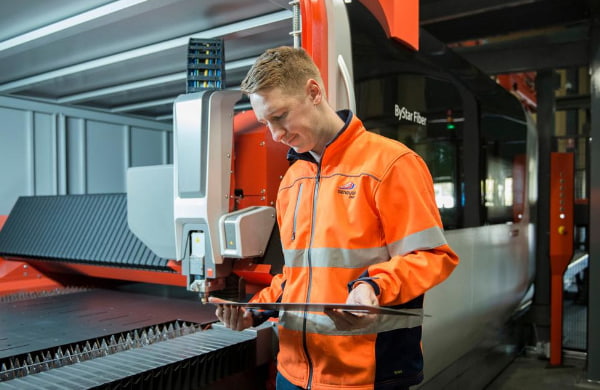 Man using machinery to drill