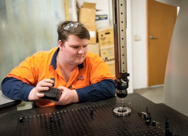 Man working at the machinery