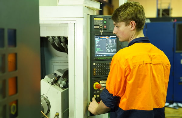 Man working at the machinery