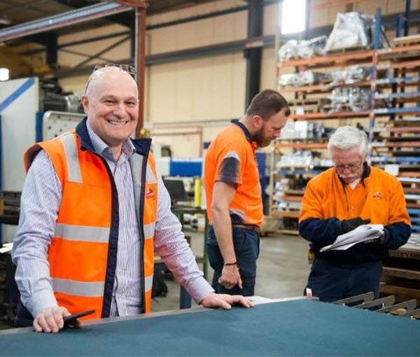 SG - Customers and industry A group of men working at the warehouse