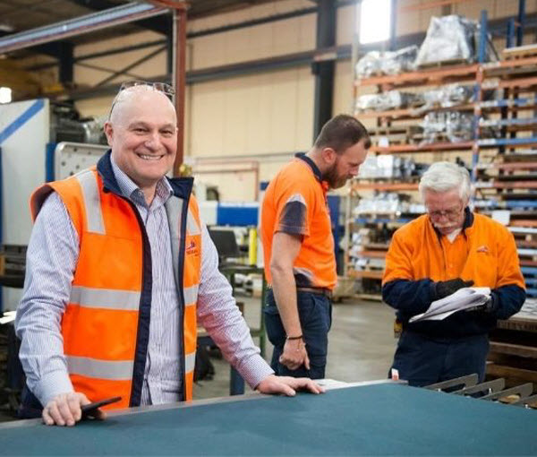 A group of men working at the warehouse